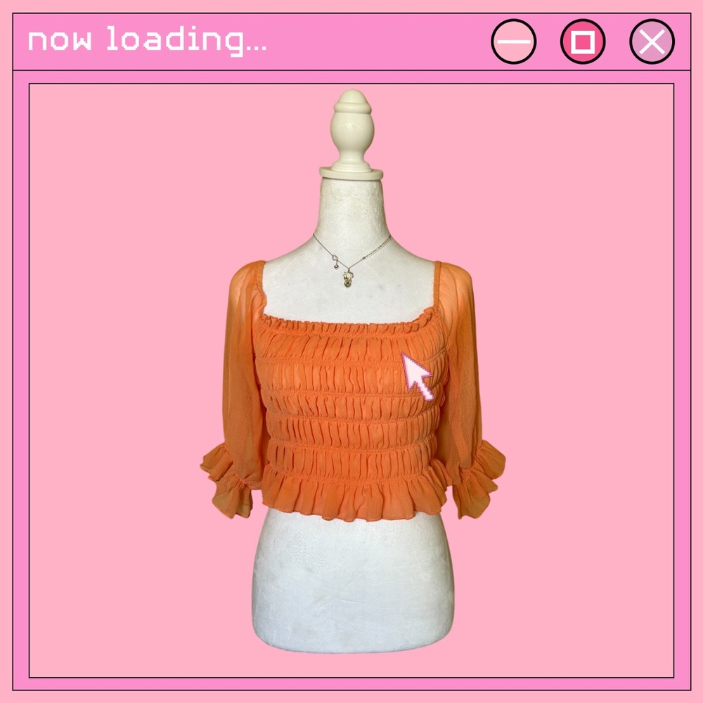 Urban Outfitters coral ruffled top